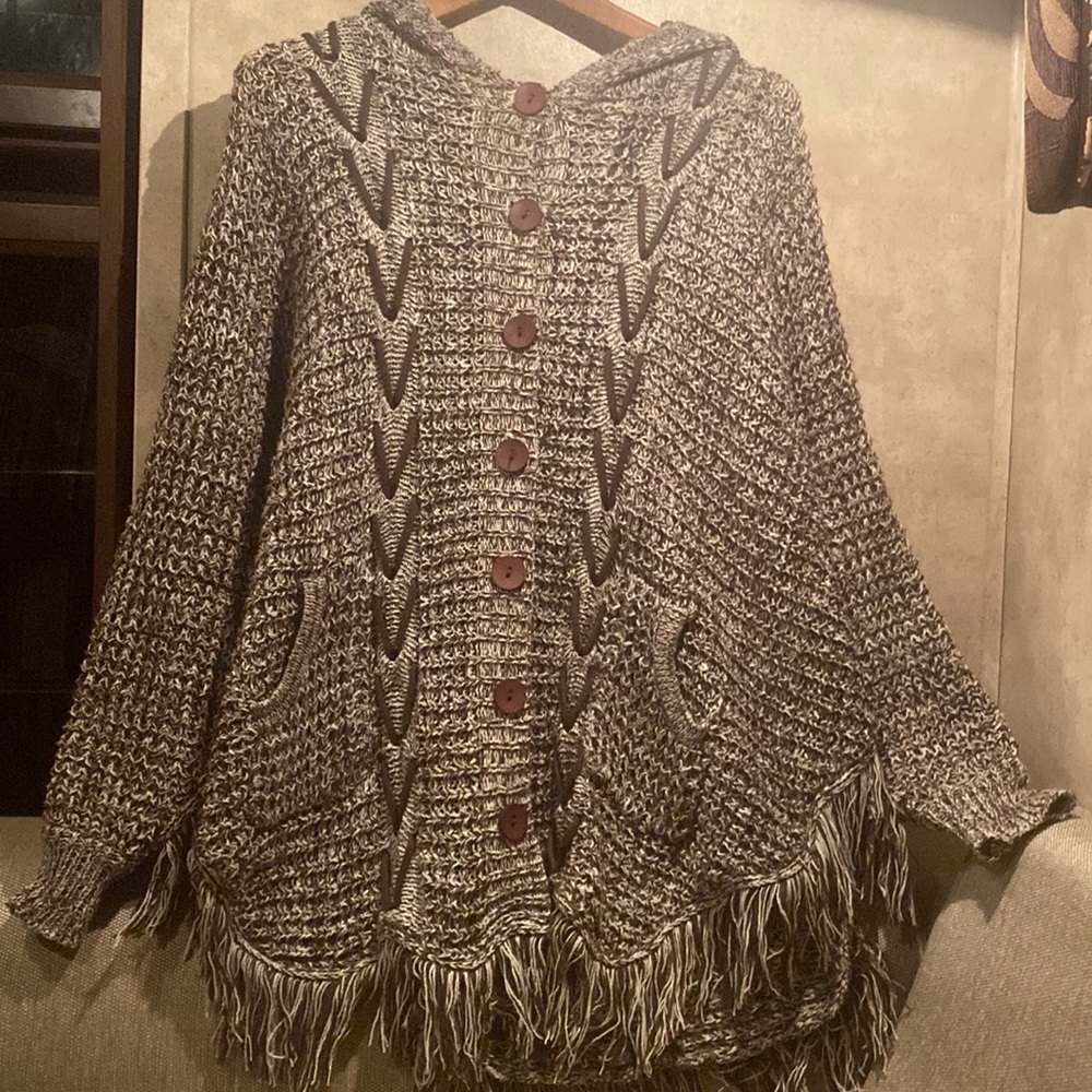 Ladies brown and cream, two-toned, hooded poncho/cape. Decorative wooden buttons